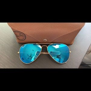 Polarized blue lens with gold outline ray bans